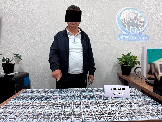Сотрудник хокимията Ташкентской области задержан при получении взятки в 8400 долларов