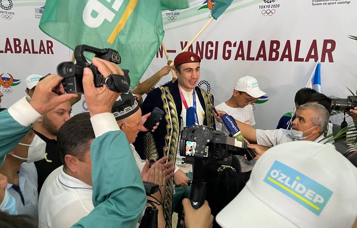 Olimpiyachilarimiz tantanali ravishda kutib olindi (foto)