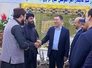 Эркинжон Турдимов Балх вилояти раҳбари Муҳаммад Юсуф Вафо билан.